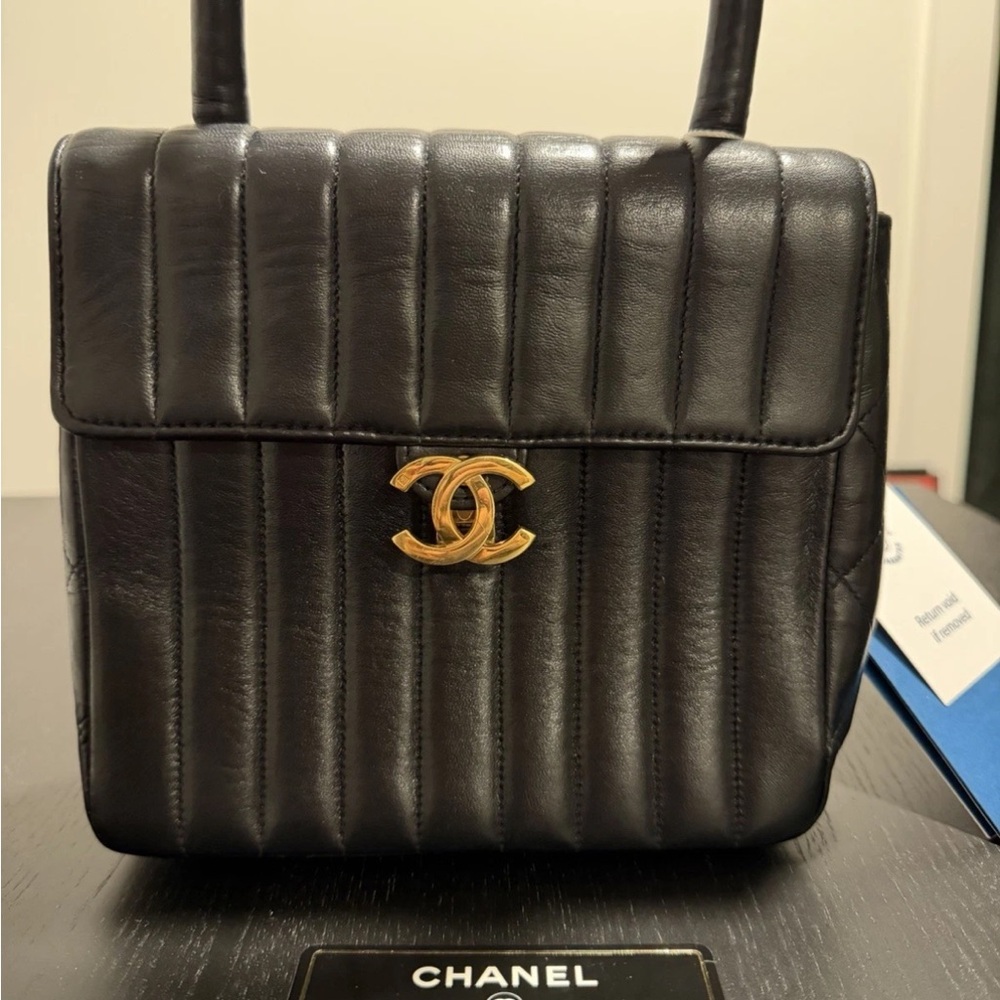 Certified Authentic Chanel Black Vertical Quilted Shoulder Bag